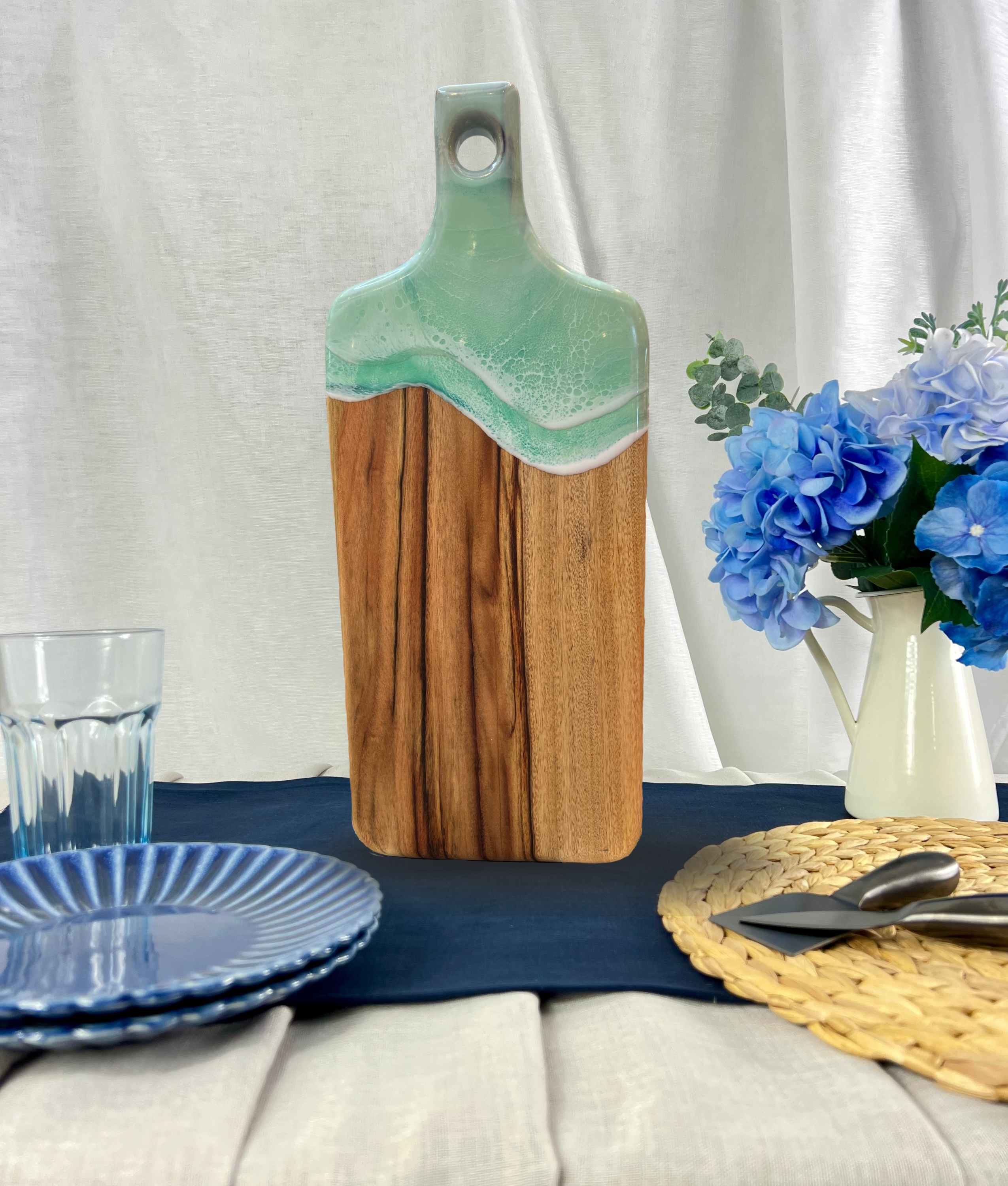 Large big paddle handmade cutting cheeseboard with resin ocean waves and camphor laurel strong grain timber in pastel mint green colours, free engraving or personalisation