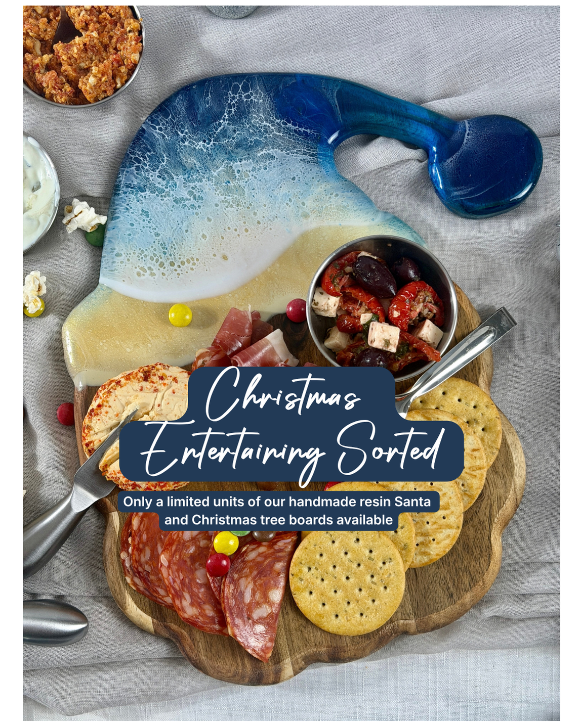 Handmade resin Santa shaped serving board with crackers and charcuterie