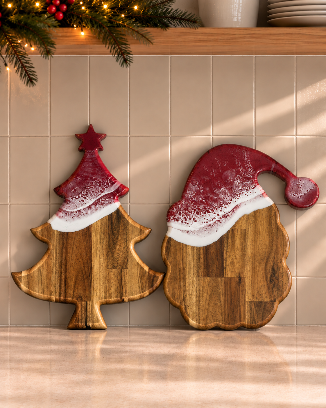 Two wooden holiday serving boards shaped like a Christmas tree and Santa Claus, decorated with red and white faux fur trim, displayed on a kitchen counter.