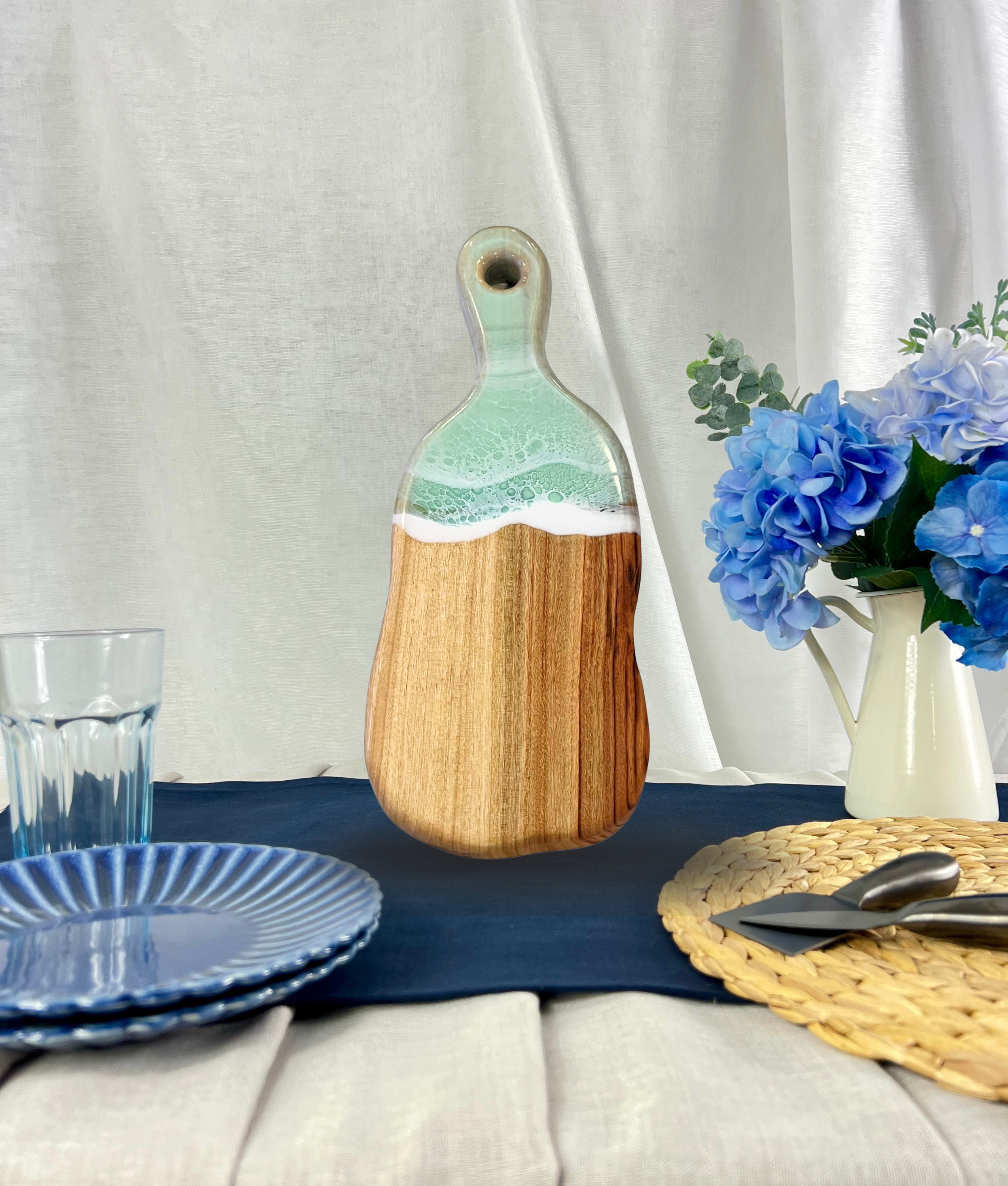Small handmade cutting cheeseboard with resin ocean waves and camphor laurel timber in pastel mint green  colours, free engraving or personalisation
