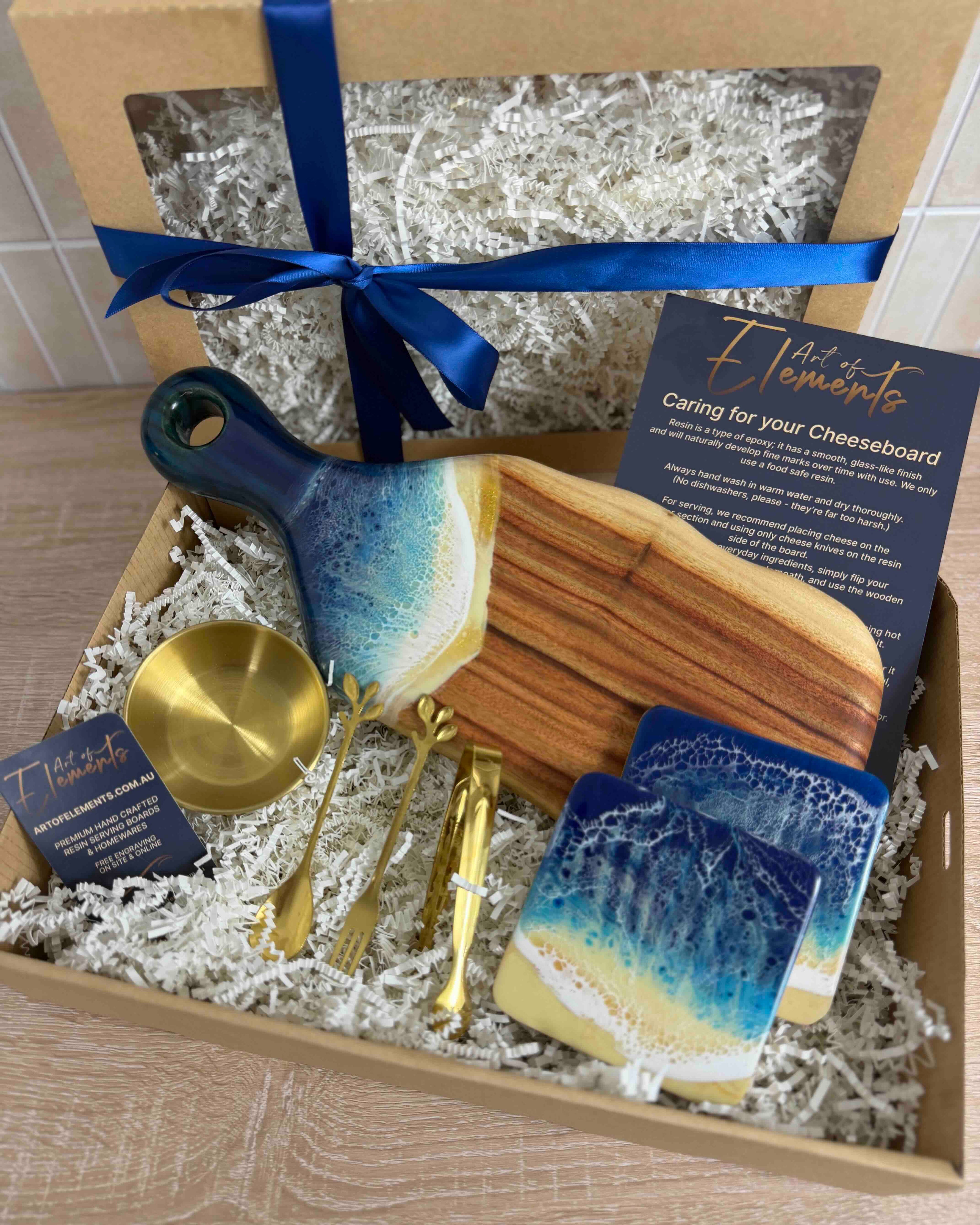 gift-box-beach-small-paddle-cheeseboard-set-free-wrapped-beach-resin-waves.jpg