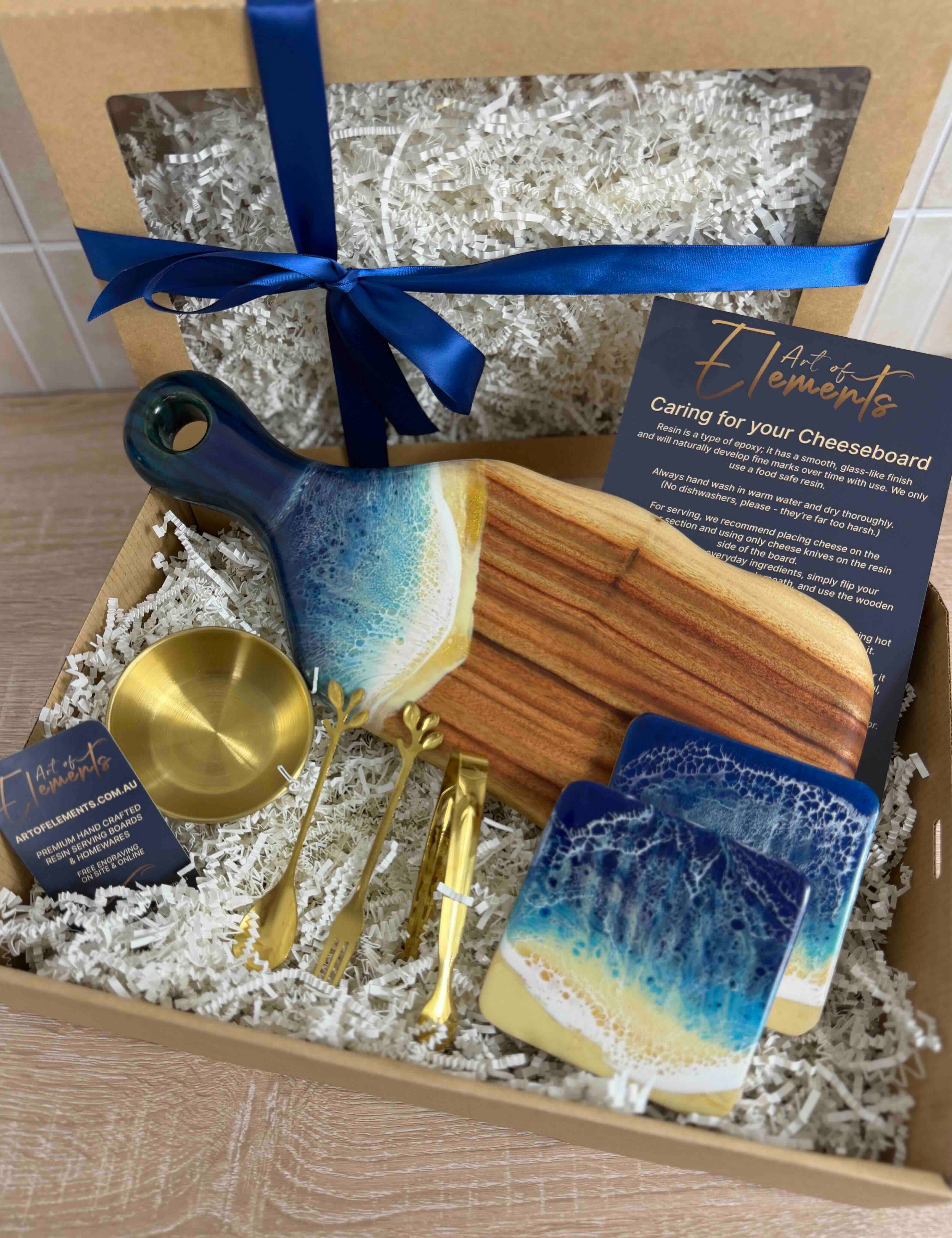 gift-box-beach-small-paddle-cheeseboard-set-free-wrapped-beach-resin-waves.jpg
