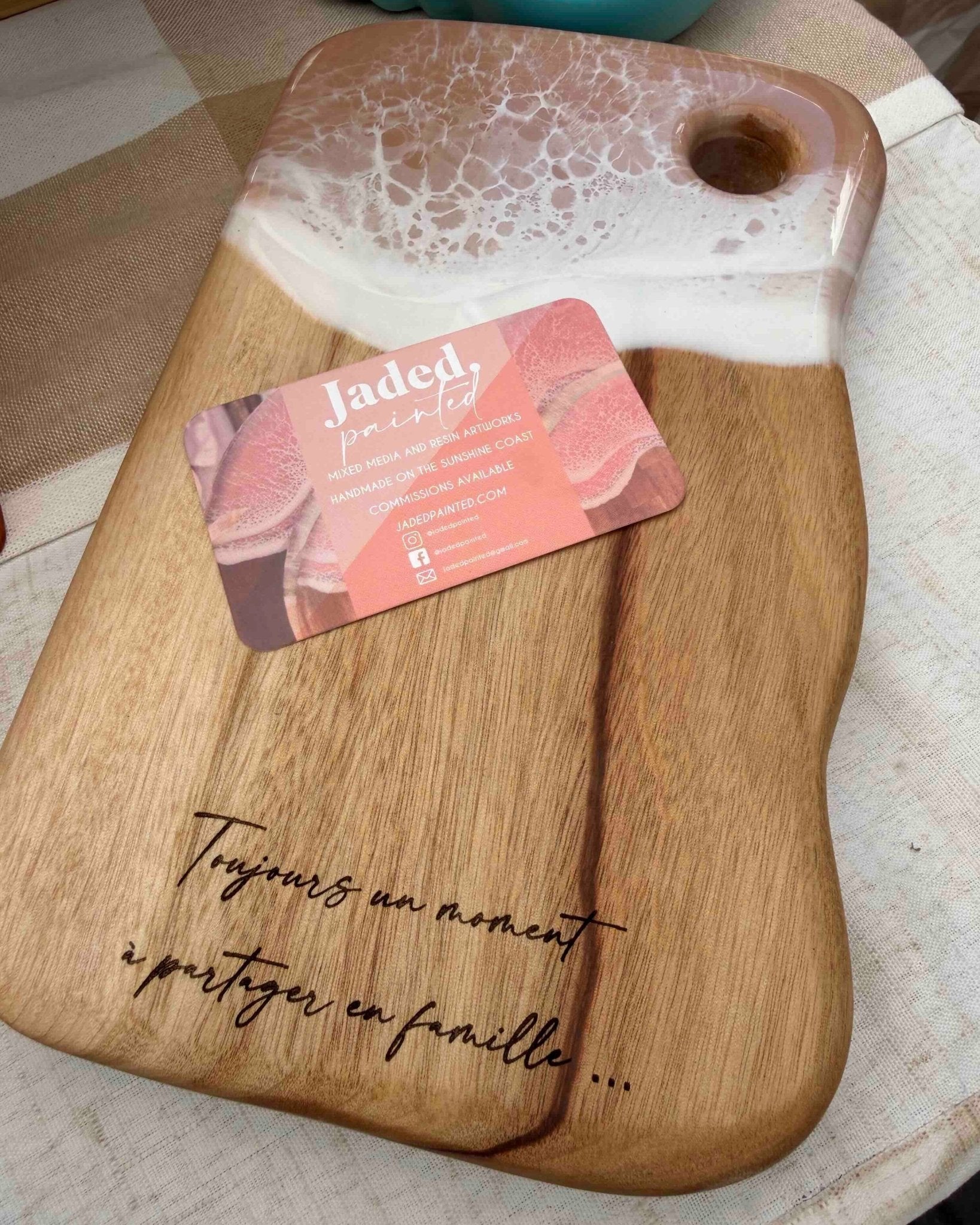 The mini board with beige / neutral coloured resin with personalised engraving in a foreign language 