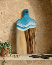 Light Blue Esperance Rectangle Paddle Cheeseboard with ocean inspired resin wave on Camphor Laurel timber