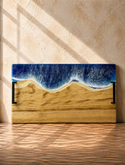 Wide handle serving platter with beach blue resin on the long edge and matte black carry handles for practicality 