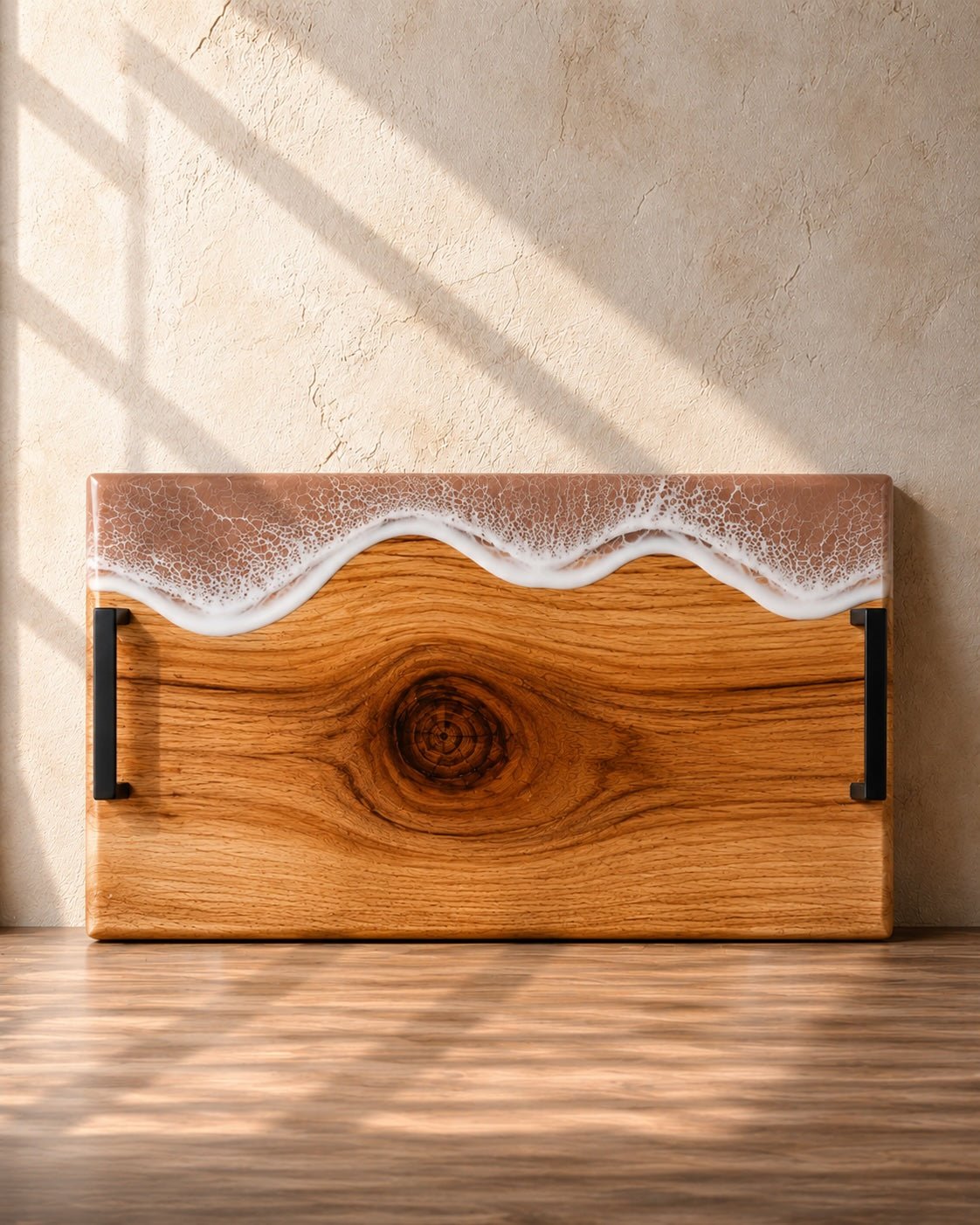 Wide handle serving platter with beige / neutral resin on the long edge and matte black carry handles for practicality 