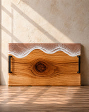 Wide handle serving platter with beige / neutral resin on the long edge and matte black carry handles for practicality 
