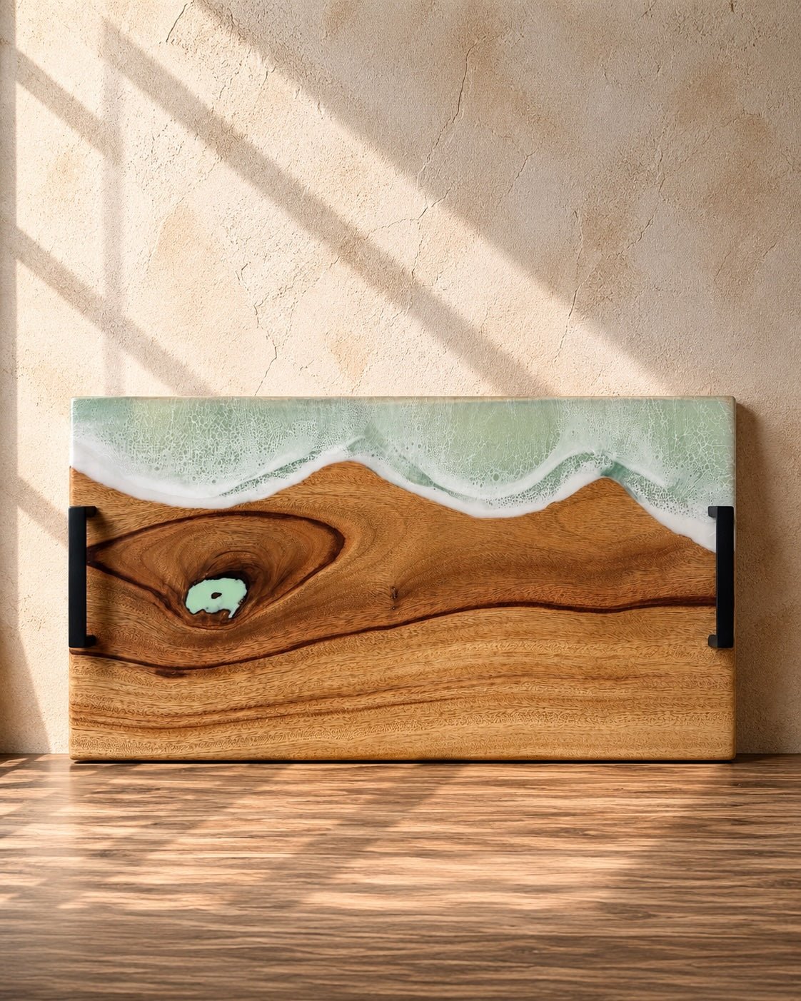 Wide handle serving platter with mint green resin on the long edge and matte black carry handles for practicality 