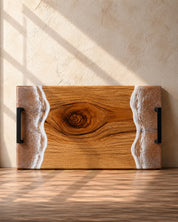 Camphor laurel cutting board with beige resin waves on a wooden kitchen